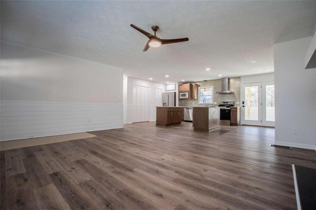280 Hitchcock Rd, Dallas, GA 30157 - unfurnished living room featuring dark wood-style flooring, ceiling fan, wainscoting, recessed lighting, and a sink
