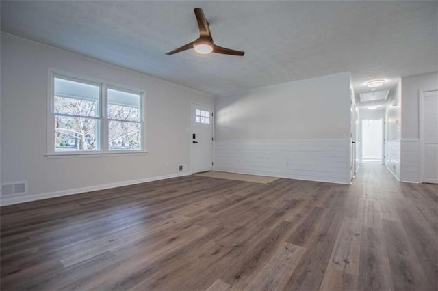 280 Hitchcock Rd, Dallas, GA 30157 - unfurnished living room featuring ornamental molding, wood finished floors, a ceiling fan, and a wainscoted wall