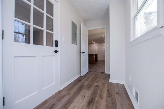 280 Hitchcock Rd, Dallas, GA 30157 - corridor featuring electric panel, wood finished floors, and baseboards