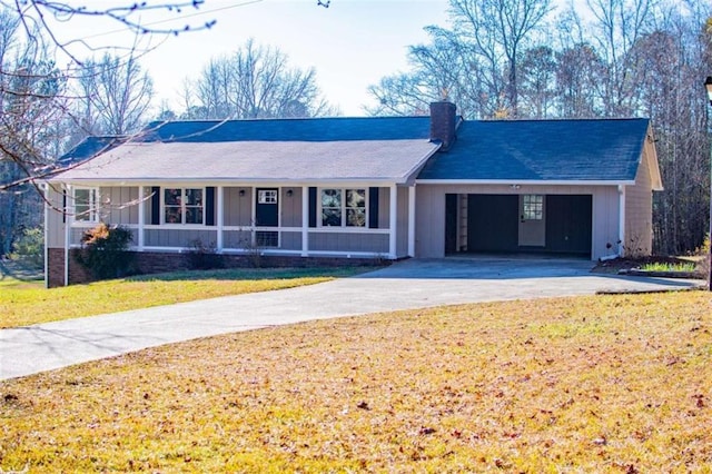 280 Hitchcock Rd, Dallas, GA 30157 - ranch-style home with driveway, board and batten siding, a chimney, a front yard, and an attached carport