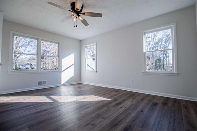 280 Hitchcock Rd, Dallas, GA 30157 - unfurnished room with dark wood-style floors, baseboards, and a ceiling fan
