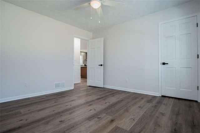 280 Hitchcock Rd, Dallas, GA 30157 - unfurnished bedroom featuring wood finished floors, baseboards, and ceiling fan