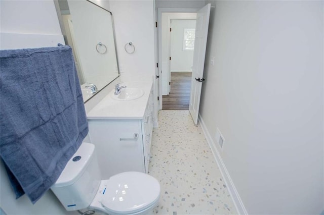 280 Hitchcock Rd, Dallas, GA 30157 - bathroom featuring baseboards, vanity, and toilet
