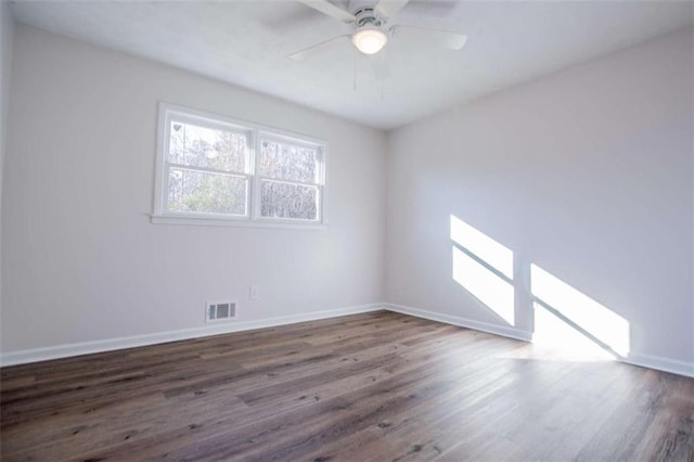 280 Hitchcock Rd, Dallas, GA 30157 - unfurnished room featuring dark wood-style flooring, baseboards, and a ceiling fan