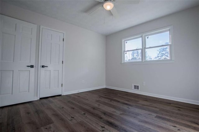 280 Hitchcock Rd, Dallas, GA 30157 - unfurnished bedroom featuring wood finished floors, baseboards, and ceiling fan