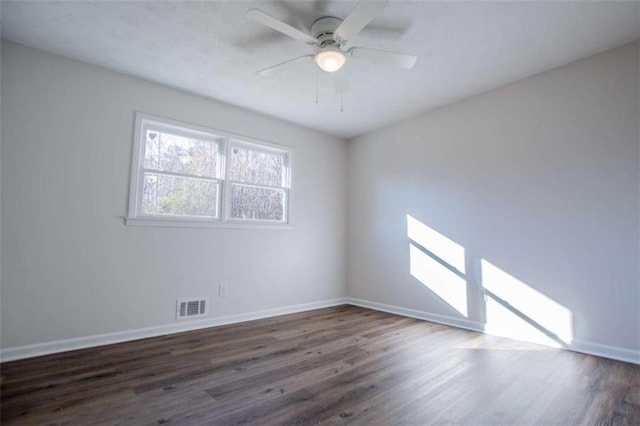 280 Hitchcock Rd, Dallas, GA 30157 - empty room featuring dark wood-type flooring, baseboards, and ceiling fan
