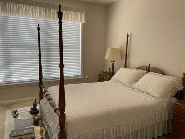 3334 Peachtree Rd NE Unit 1110, Atlanta, GA 30326 - bedroom featuring baseboards