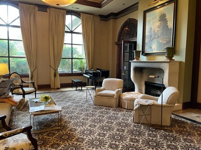 sitting room with ornamental molding