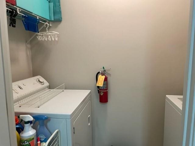 3334 Peachtree Rd NE Unit 1110, Atlanta, GA 30326 - clothes washing area featuring independent washer and dryer and laundry area
