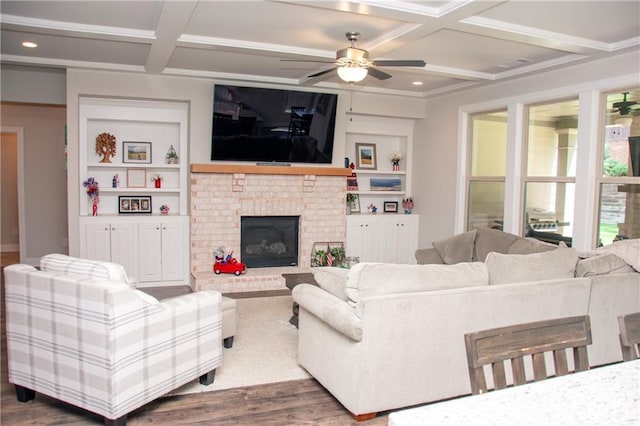 2159 Holland Creek Ln, Buford, GA 30519 - living room with coffered ceiling, ceiling fan, wood finished floors, a fireplace, and beamed ceiling