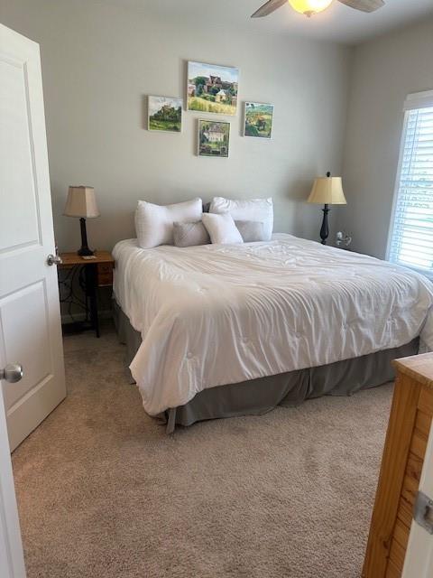2159 Holland Creek Ln, Buford, GA 30519 - bedroom featuring carpet floors and a ceiling fan