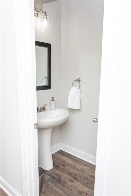 2159 Holland Creek Ln, Buford, GA 30519 - bathroom with baseboards and wood finished floors