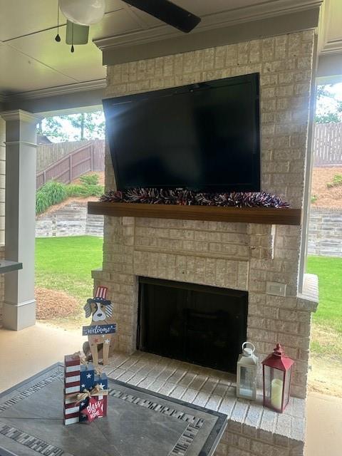 2159 Holland Creek Ln, Buford, GA 30519 - detailed view of an outdoor brick fireplace and crown molding