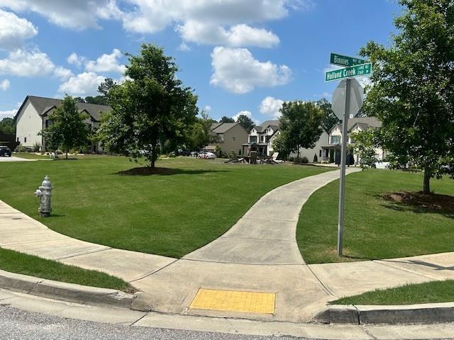 2159 Holland Creek Ln, Buford, GA 30519 - view of property's community featuring a residential view and a lawn