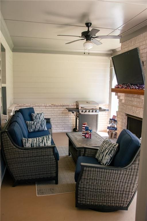 2159 Holland Creek Ln, Buford, GA 30519 - living room featuring a ceiling fan, a large fireplace, and crown molding