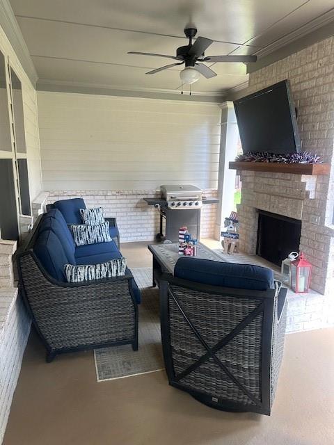 2159 Holland Creek Ln, Buford, GA 30519 - view of patio featuring ceiling fan, an outdoor living space with a fireplace, and a grill