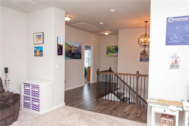 2159 Holland Creek Ln, Buford, GA 30519 - hall with attic access, an upstairs landing, and carpet flooring