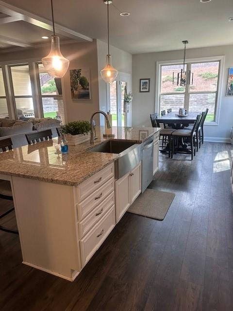 2159 Holland Creek Ln, Buford, GA 30519 - kitchen featuring a sink, white cabinets, light stone counters, dark wood-style flooring, and plenty of natural light