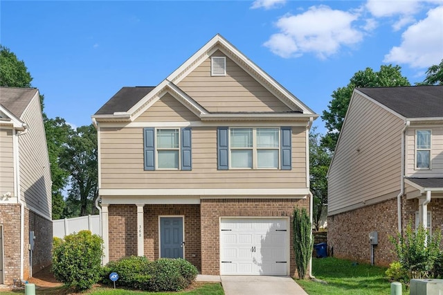 368 Rankin Cir, Mcdonough, GA 30253 - view of front of house featuring brick siding, an attached garage, and driveway