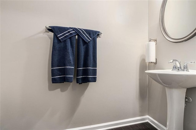 368 Rankin Cir, Mcdonough, GA 30253 - bathroom with baseboards and wood finished floors