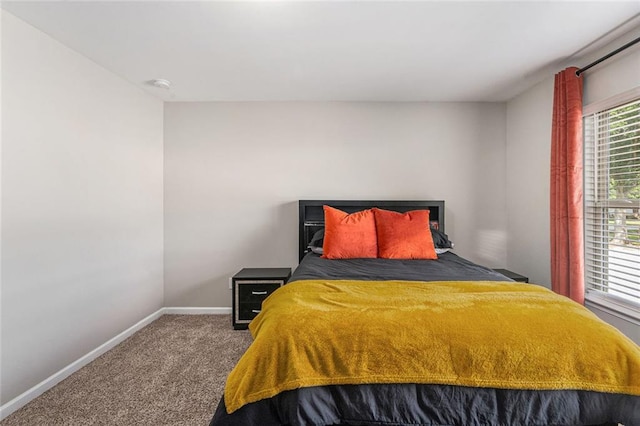 368 Rankin Cir, Mcdonough, GA 30253 - carpeted bedroom featuring baseboards