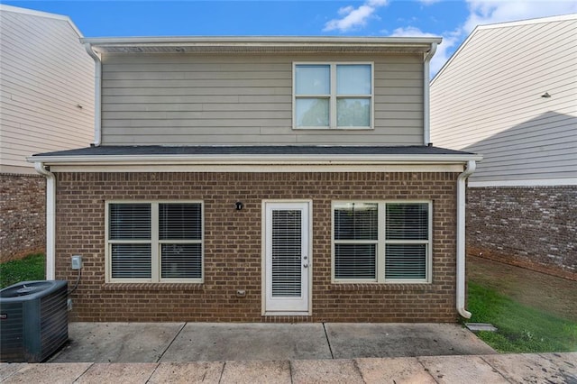 368 Rankin Cir, Mcdonough, GA 30253 - back of house featuring a patio area and brick siding