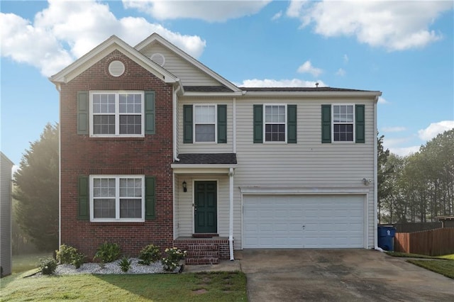 view of front of property featuring a garage