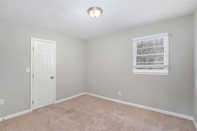 unfurnished room with carpet