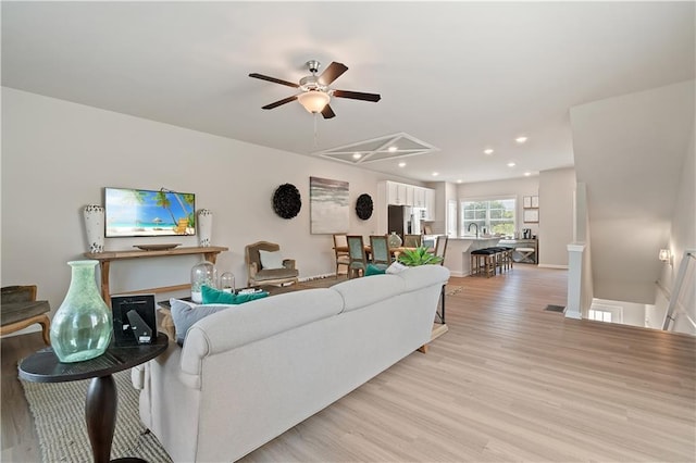 27 Cobalt Ln Unit 77, Newnan, GA 30265 - living area featuring ceiling fan, light wood-type flooring, and recessed lighting