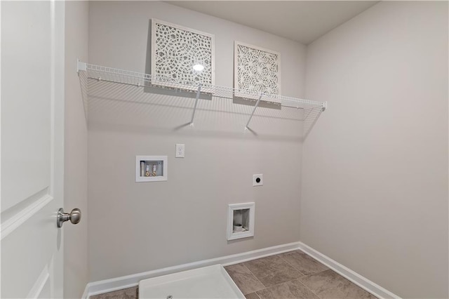 27 Cobalt Ln Unit 77, Newnan, GA 30265 - laundry room with hookup for an electric dryer, hookup for a washing machine, and baseboards