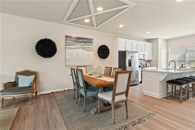 27 Cobalt Ln Unit 77, Newnan, GA 30265 - dining area featuring light wood-style flooring, recessed lighting, and baseboards