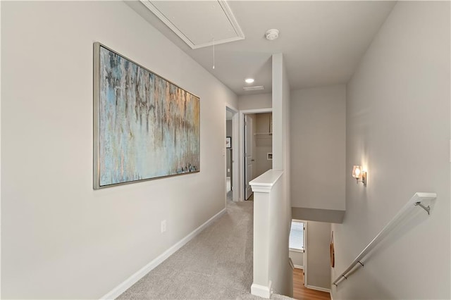 27 Cobalt Ln Unit 77, Newnan, GA 30265 - corridor with an upstairs landing, attic access, baseboards, light carpet, and recessed lighting