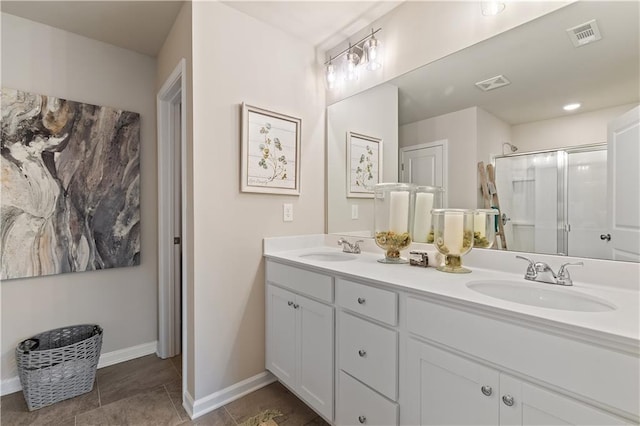 27 Cobalt Ln Unit 77, Newnan, GA 30265 - bathroom featuring a stall shower, double vanity, and baseboards