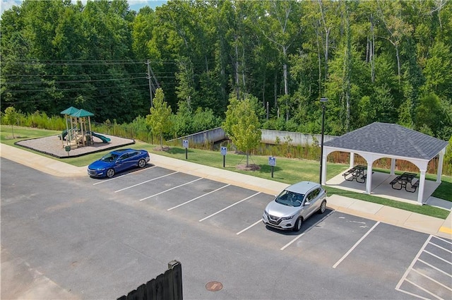 27 Cobalt Ln Unit 77, Newnan, GA 30265 - uncovered parking lot featuring a gazebo and fence