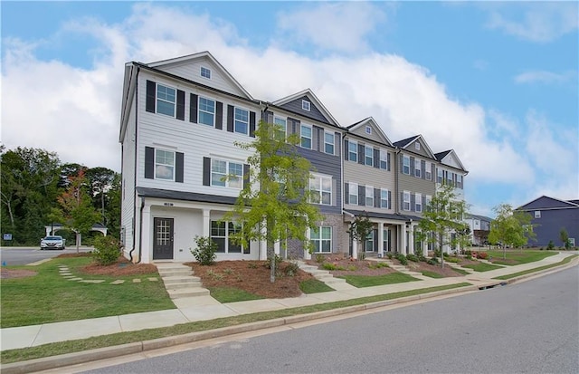 27 Cobalt Ln Unit 77, Newnan, GA 30265 - multi unit property featuring a residential view and a front lawn