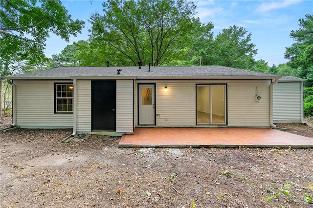 rear view of house with a patio