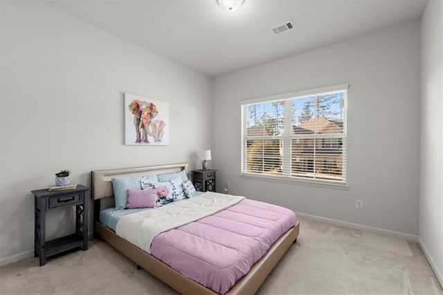 bedroom featuring carpet flooring, baseboards, and visible vents