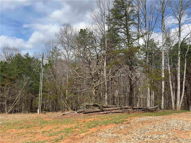 view of landscape with a view of trees