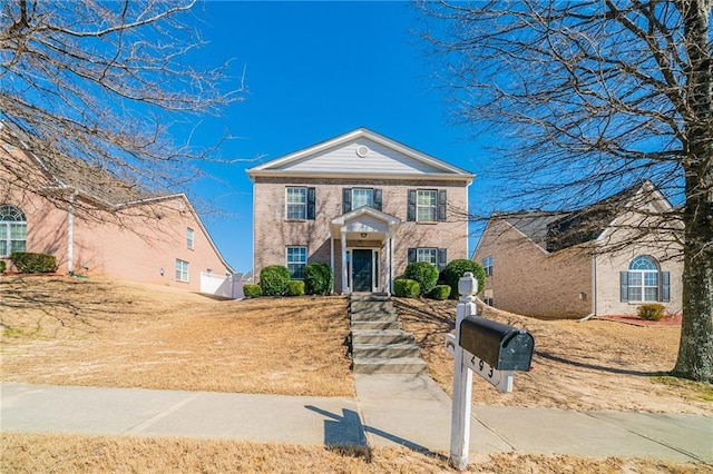 view of front of property with brick siding