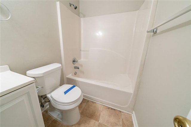 bathroom featuring toilet, shower / tub combination, and vanity