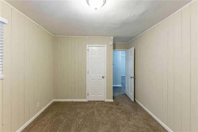 2363 Dabney Ter, Atlanta, GA 30344 - spare room featuring wooden walls and carpet floors