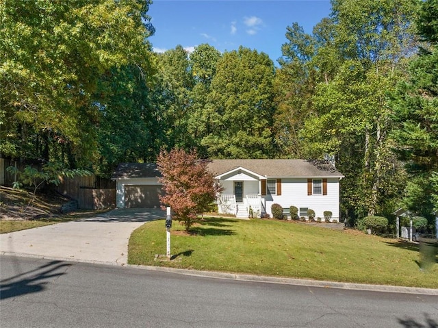 ranch-style home with a front yard and a garage