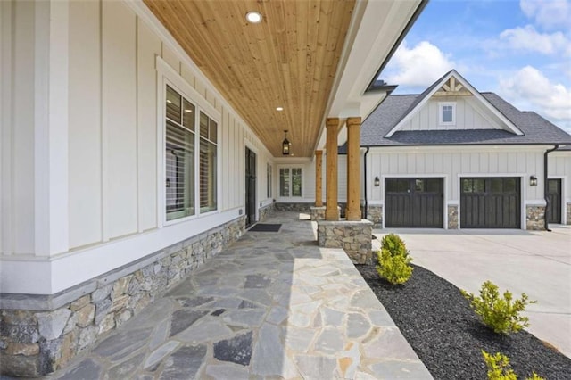 view of patio featuring a garage