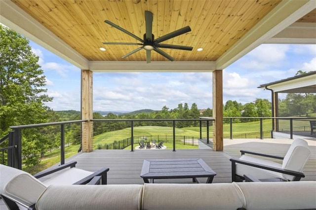 view of patio / terrace featuring ceiling fan