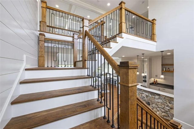 stairway with a towering ceiling