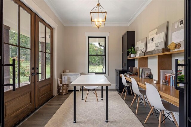 office space featuring a chandelier, french doors, hardwood / wood-style floors, and ornamental molding