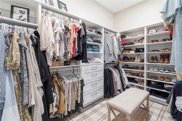 spacious closet featuring hardwood / wood-style flooring