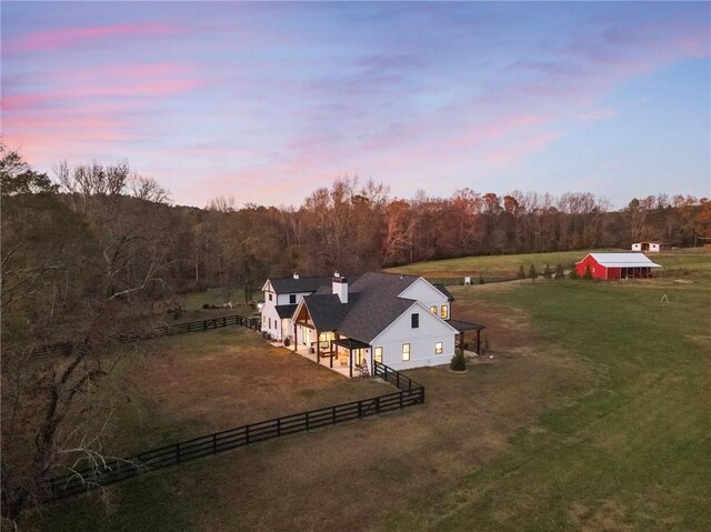 aerial view at dusk with a rural view