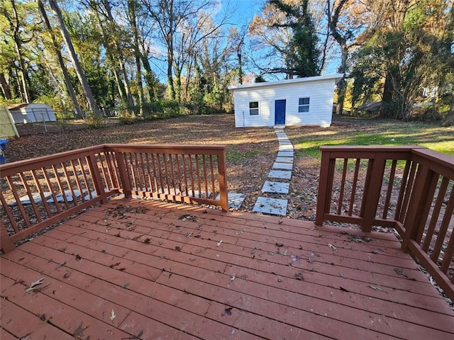 deck featuring a shed