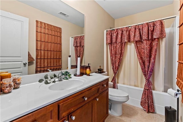 bathroom featuring vanity, visible vents, shower / tub combo, tile patterned floors, and toilet